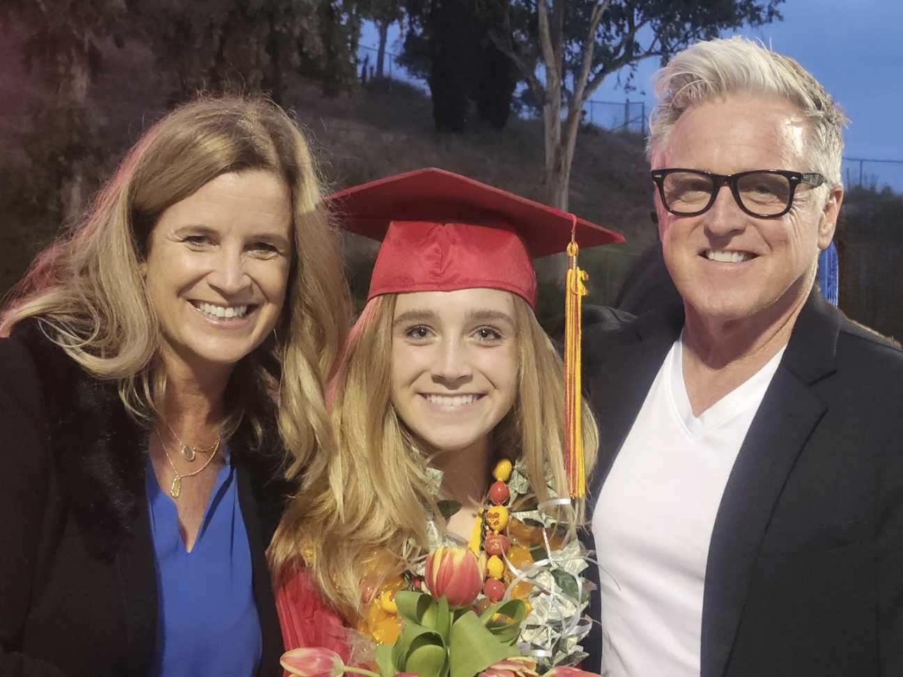 Kris Spowart with her family at a graduation celebration